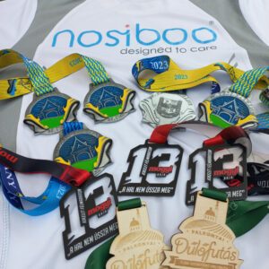 Medals received by Nosiboo's running team.